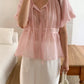 suri blouse