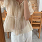 suri blouse